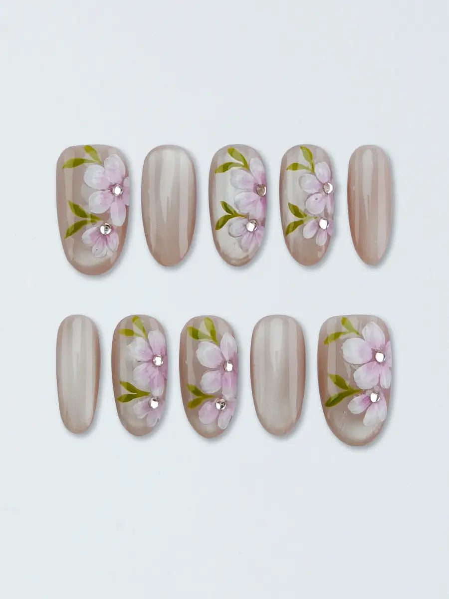 Nude Pink Hand-Painted Floral Press-On Nails with Rhinestones – Medium Round