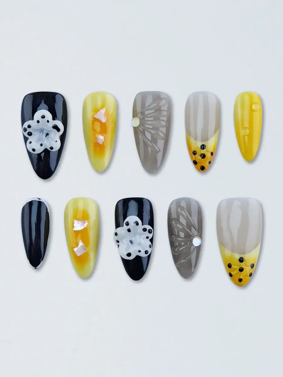 Cute & Edgy Almond Nails with Polka Dot Tips and Raised Floral Elements   Black-Yellow-Grey Design