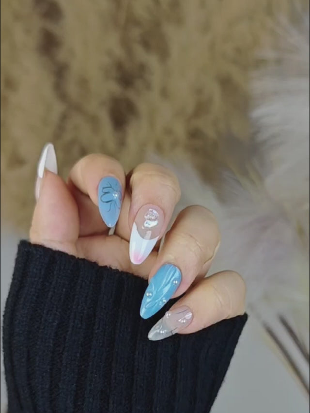 Whimsical Butterfly Press Ons with Blue-Pink-White French Tips and Silver Highlights – Almond Nails